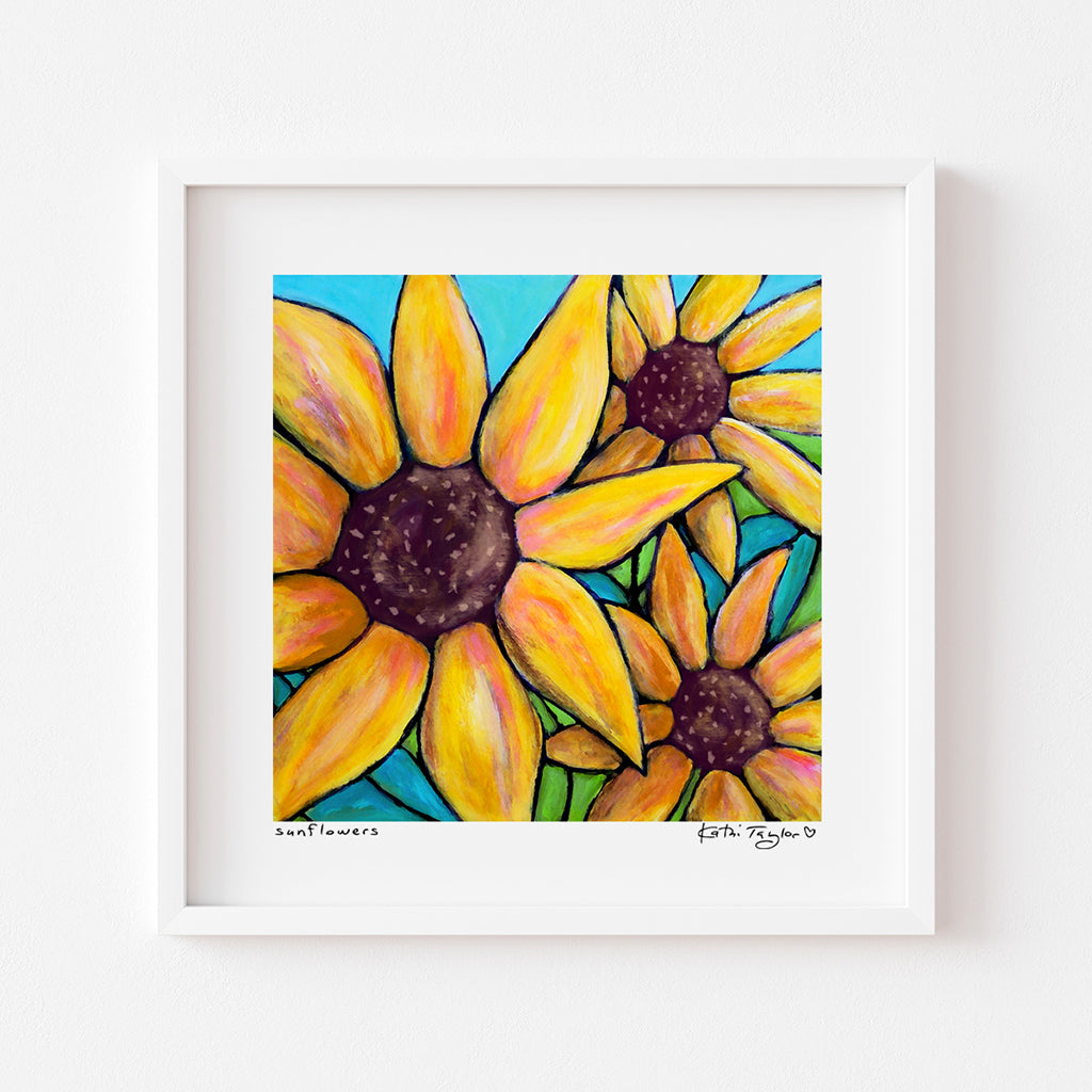 art print by Kathi Taylor of bright yellow sunflowers with a colorful background.