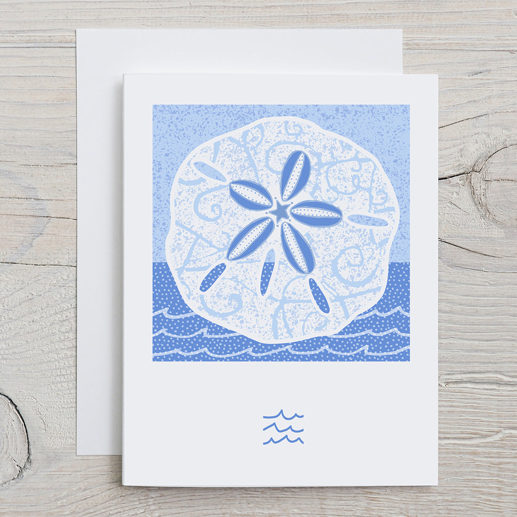 KatCo Creations greeting card with a sand dollar design on a blue ocean themed background.